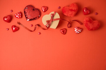 Valentine's day holiday concept with gift box and heart shape on red background