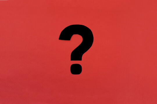 The question mark is black on a red background. The concept of dialogue, clarification of the situation. Decision making.