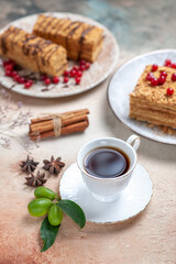 front view yummy cake slice with tea and berries on light background cake biscuit sweet
