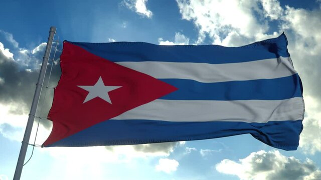 Cuba flag waving in the wind against deep blue sky. National theme, international concept