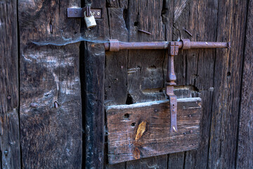 .Old door with cobwebs.