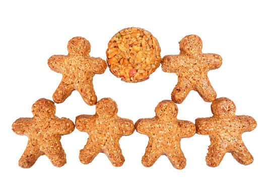 Human shape cookies isolated on white. A group of people holding a circle in their hands