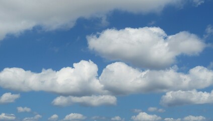 Naklejka na ściany i meble Panoramic view of blue sky with clouds