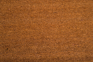 Brown doormat carpet, textured background