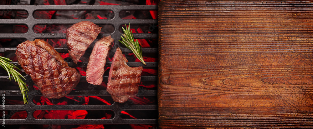 Canvas Prints beef steaks cooking on grill