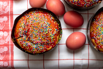 Easter. Easter cake with sweet red fondant and Easter eggs. Easter atmosphere.
