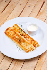 stuffed pancakes with sour cream