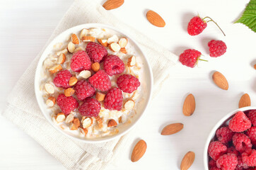 Oatmeal porridge with raspberries and nuts