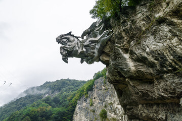 Cloudy view of Monument Wasgergi (George The Victorious) in a rock of North Ossetia Alania, North...