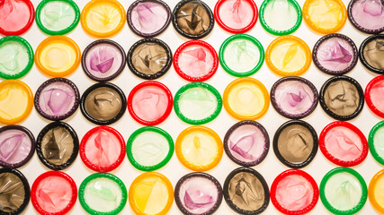 Colorful condoms background.