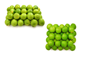 Many fresh limes on white background.