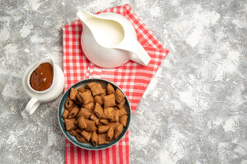 top view sweet pillow cookies with chocolate sauce on white background sweet milk breakfast