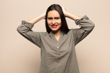 young hispanic woman feeling frustrated and annoyed, sick and tired of failure, fed-up with dull,...