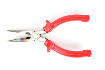 Metal platypuses with red plastic handles isolated on white