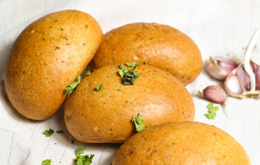 Homemade rosy buns with spices for soup.