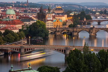 Vltava River and Prague cityscape at sunset. Czech Republic.