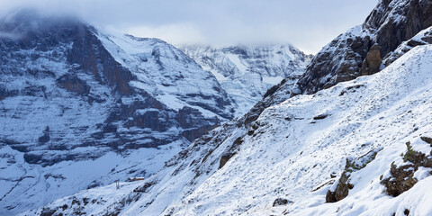 Dramatic panoramic view of the mountains covered by fresh snow in the Jungfrau region in Switzerland.
