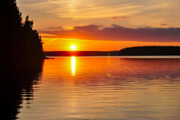 Scenic summer sunset over lake near Lappeenranta, Finland