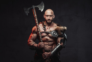 Portrait of a strong and hairless scandinavian seafarer with naked torso and muscular grimy build...