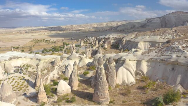 Aerial view volcano formation of Fairy Chimneys or stone like mushrooms in Pasabag Valley, Cappadocia, Anatolia, Turkey - 2020. Aerial view 4K.