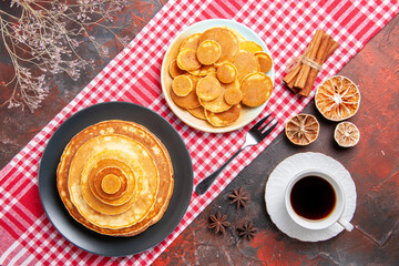 Favourite breakfast with tea cup and pancakes
