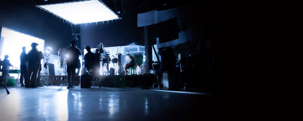 Silhouette images of video production behind the scenes or b-roll or making of TV commercial movies...