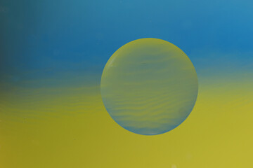 Abstract ball on yellow-blue background