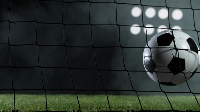 Super slow motion of soccer ball flying into goal. Filmed on high speed cinema camera, 1000fps.