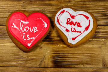 Heart shaped gingerbread cookies on wooden table.  Top view. Dessert for valentine day