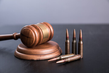 judge hammer gavel with bullets