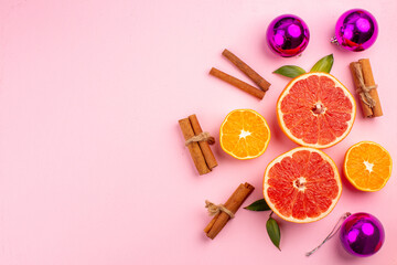 Fototapeta na wymiar top view tasty grapefruits fruit slices with cinnamon on pink background mellow color diet citrus fresh juice fruit free place