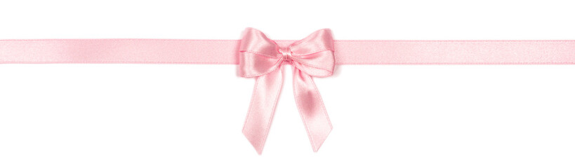 Beautiful pink ribbon with bow isolated on white background.
