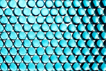 Bright blue hydrogel round shape. Macro gel balls. Concept of purity, clean, transparent, ideal and...