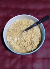 a bowl of boiled noodles ready to eat
