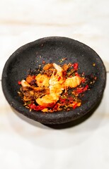 chicken with a spicy chili mixture tastes delicious