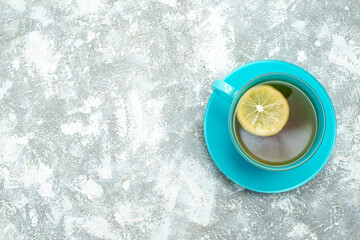 top view cup of tea with lemon slice on light background drink photo color tea ceremony breakfast free space
