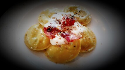Ravioli pomodoro ricotta e burrata ,  real italian food pasta 