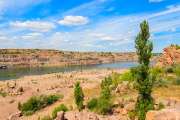 View of the lake at abandoned quarry on summer
