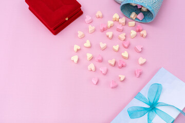 red box with heartshaped marshmallow and envelopes with blue ribbon
