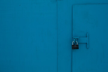 padlock on a metal door