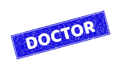 Grunge DOCTOR rectangle stamp seal. DOCTOR subtraction phrase is located inside rectangle with border. Rectangular seal with grunge texture in blue color.