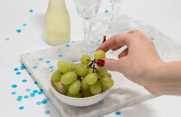 Eating grapes at midnight, a Spanish tradition for New Year's Eve