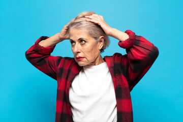 middle age woman feeling frustrated and annoyed, sick and tired of failure, fed-up with dull,...
