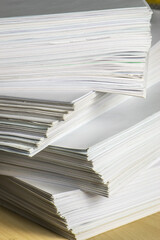 bundles bales of paper documents. stacks packs pile on the desk in the office