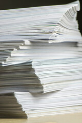bundles bales of paper documents. stacks packs pile on the desk in the office