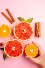 top view tasty grapefruits fruit slices with cinnamon on pink background color diet mellow fruit citrus