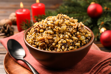 Traditional Christmas slavic dish kutia in bowl on table, closeup