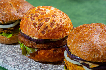 Healthy vegan or vegetarian fast food, fresh made plant based burgers with vegetables