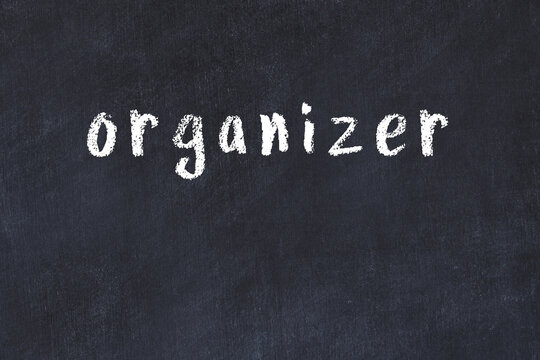 Black chalkboard with inscription organizer on in