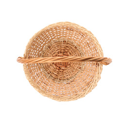 Fototapeta premium Wicker basket with handle isolated on white, top view